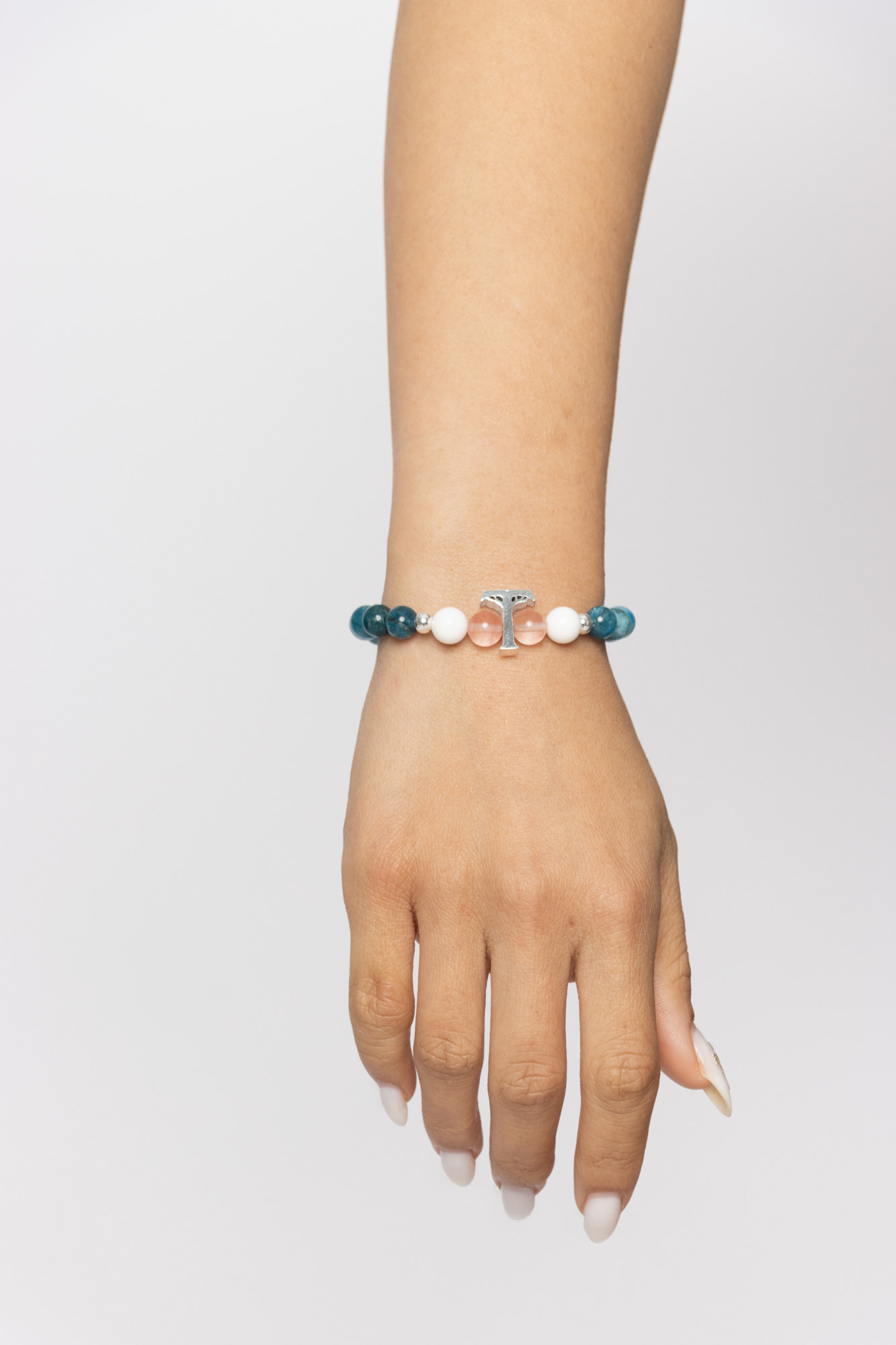Pulsera SERENA plata con Apatita, Tridacna, Cuarzo rosa sandía, cuentas de plata y logo Temba en plata maciza. (Calma)